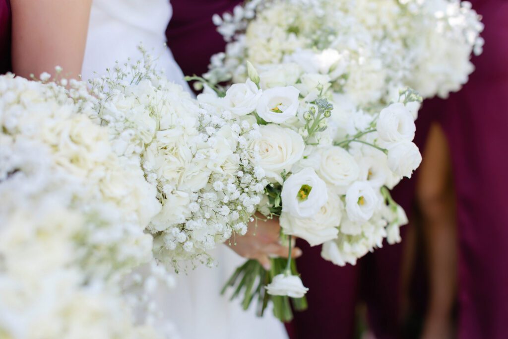 White floral bouquets at a spring wedding at Fishermen's Inn