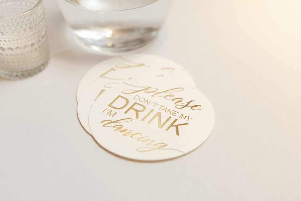Coasters with humorous drink warning