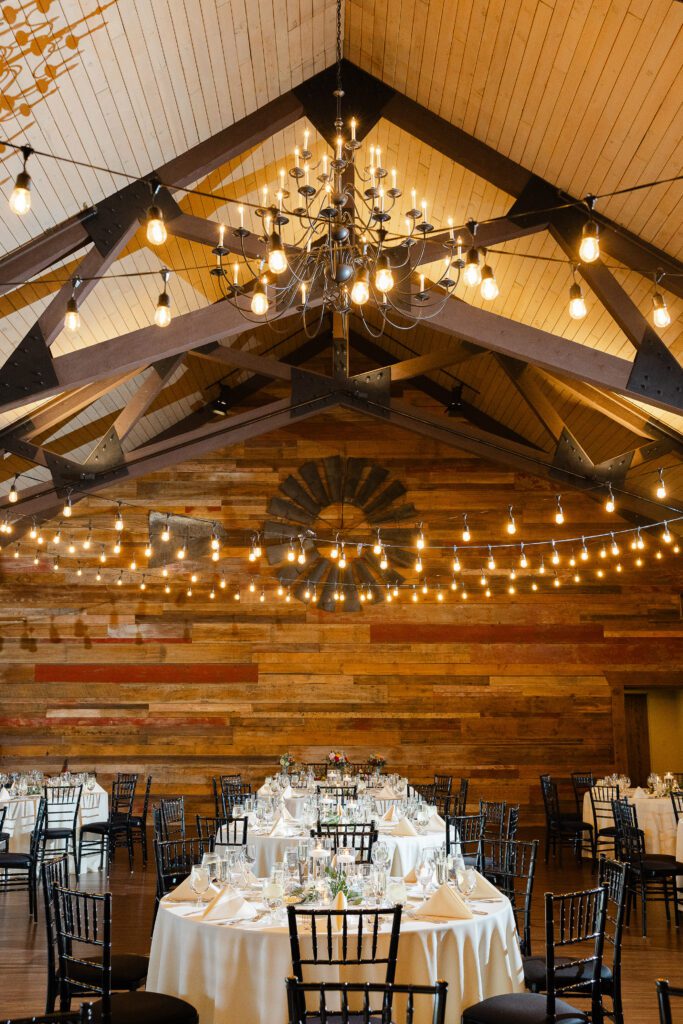 reception space with chandeliers at Fishermen’s Inn wedding venue